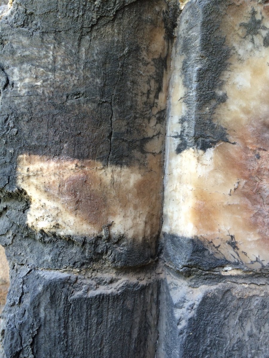 Using lasers to clean alabaster